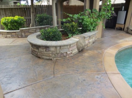 an image of a concrete driveway and patio installation in Orangevale, ca