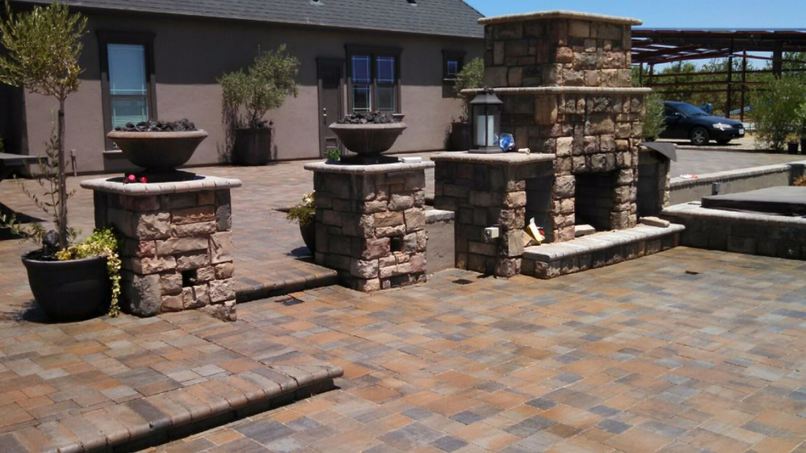 a mason made these stacked stone pillars and fireplace in granite bay california