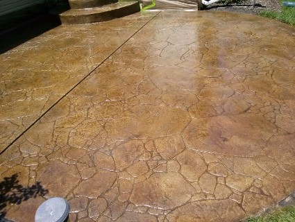 picture of dark stamped concrete patio constructed in Granite Bay, CA