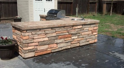 stacked stone contractor build this countertop and installed a barbecue